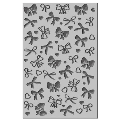 CHGCRAFT Bow Polymer Clay Texture Sheets Love Heart Texture Mat Rubber Clay Texture Mat Clay Modeling Pattern Pad Texture Sheets for Earrings Jewelry Making - style: Bow
